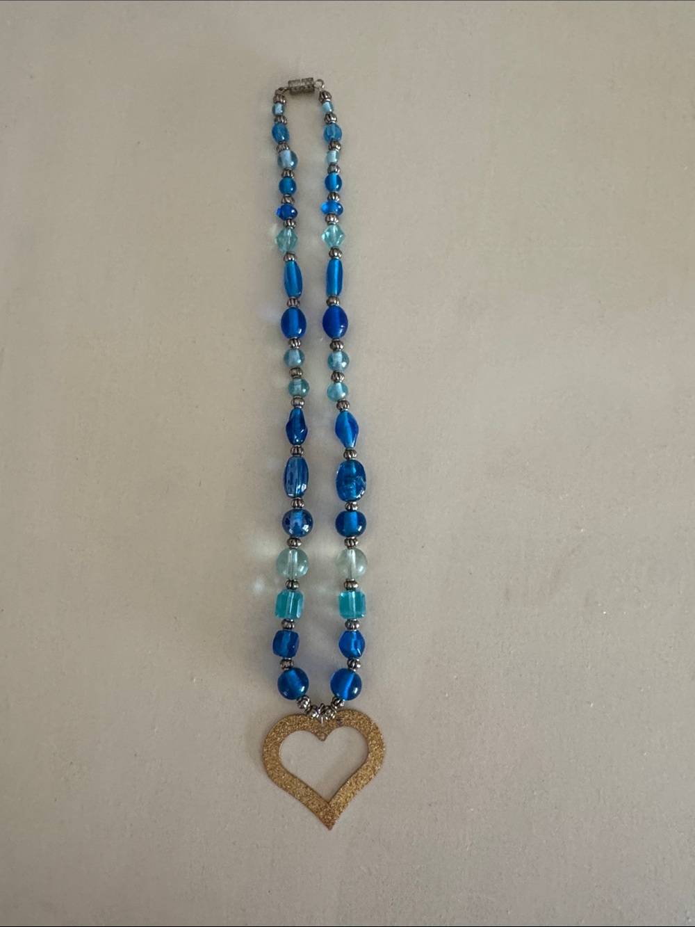 Blue Beaded Necklace with Gold Heart Pendant